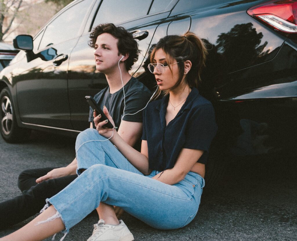 Young couple listening to music